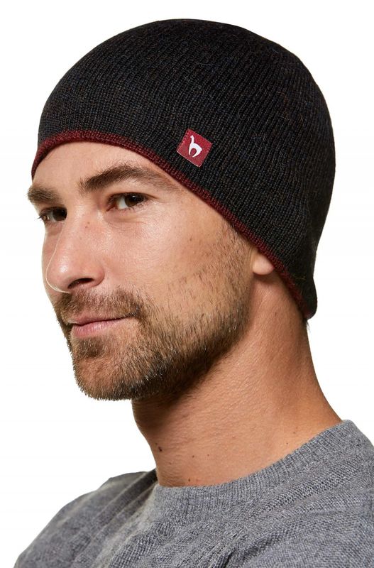 Alpakka lue, Vendbar, Sort/rød mellert